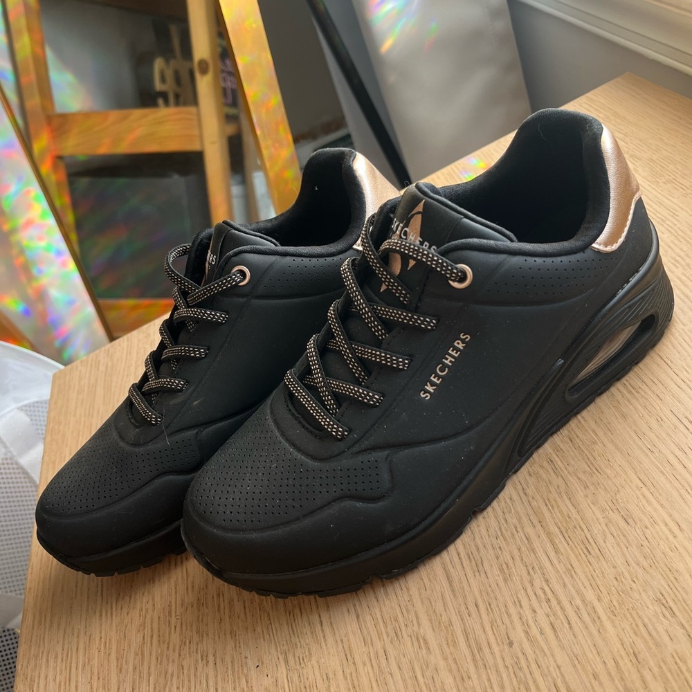 Skechers Women’s Wedge Slip-on Sneakers, black and gold. Brand new. Size 7